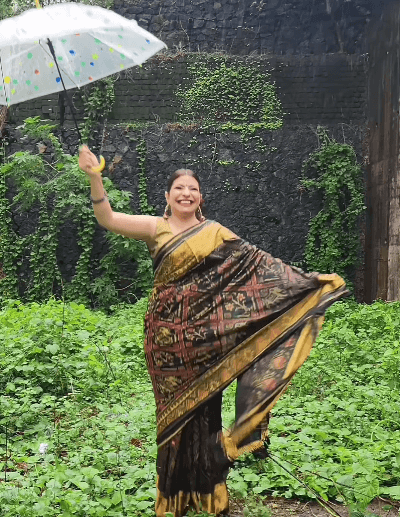 Tarak Mehta Roshan Bhabhi Holds Umbrella in Brown Saree