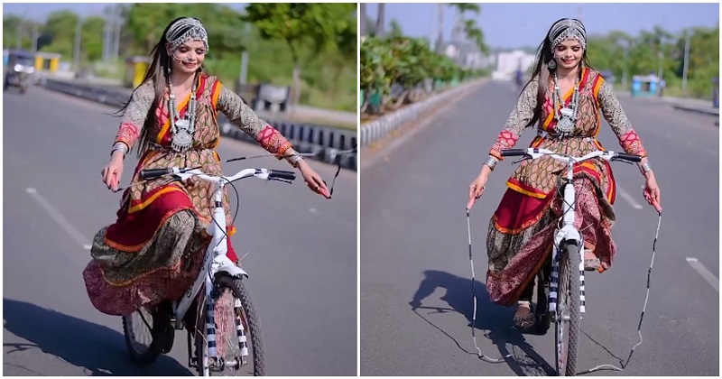 girl jumped rope on a running bicycle wearing a chaniyacholi