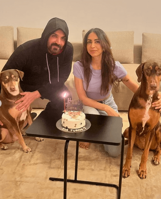 John Abraham celebrate pet dog